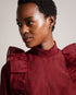 AUBREEI-Tops-Level up your wardrobe with AUBREEI. Made from organza with an oversized fit, this top strikes the perfect balance between elegance and comfort, making it an ideal choice for anything from a brunch date to a family party. Oversized organza top Frilled shoulder details 3/4 blouson sleeves Ribbed knit stand collar Lined body Button fastening Keyhole cut-out on back- Ted Baker Romania